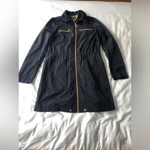Michael Kors lightweight wind breaker in dark navy is a perfect Spring addition.